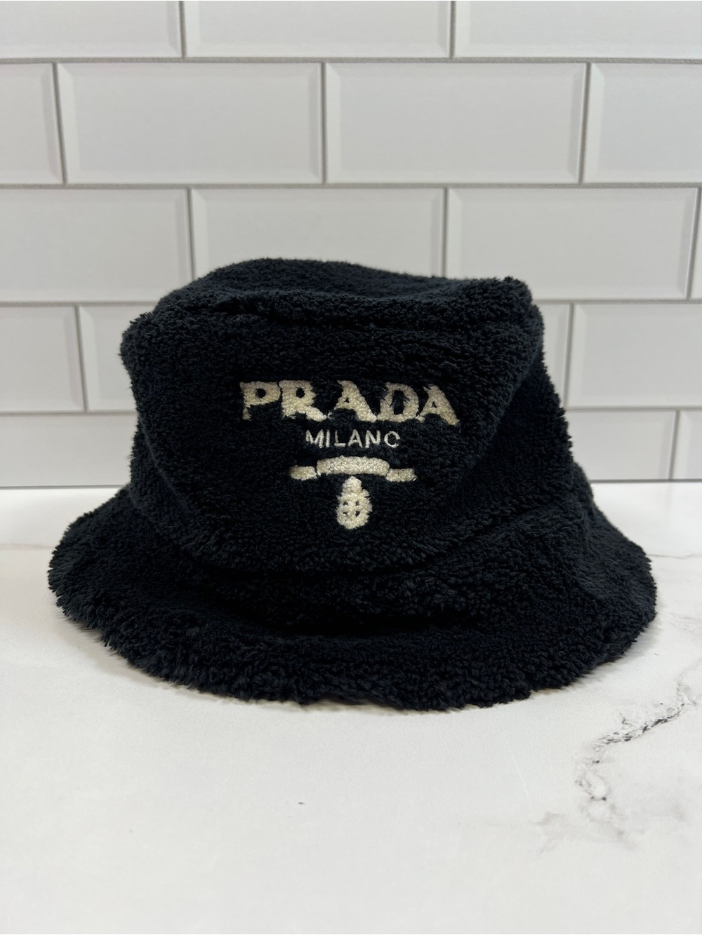 Prada Terry Fur Cloth Logo Embroidered Bucket Hat